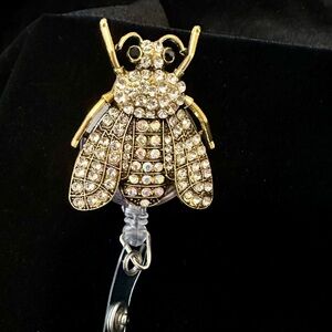 Elegant Gold-Tone Bee Badge Reel